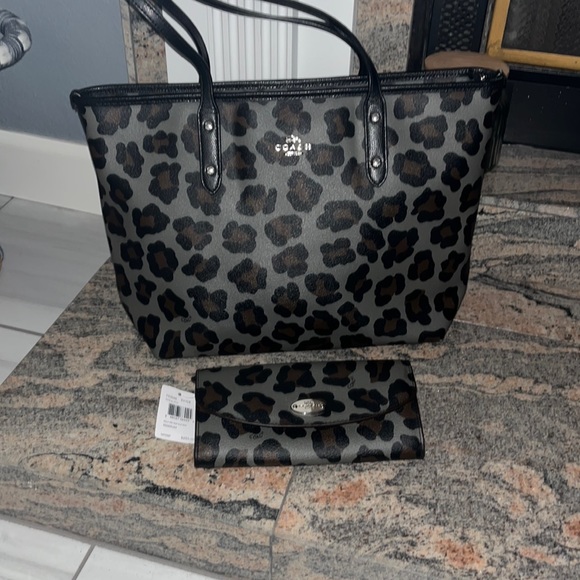 Coach Handbags - Animal print Coach shoulder bag, Excellent condition.